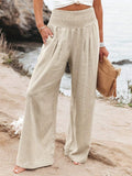 Women's woven wide-leg trousers in apricot
