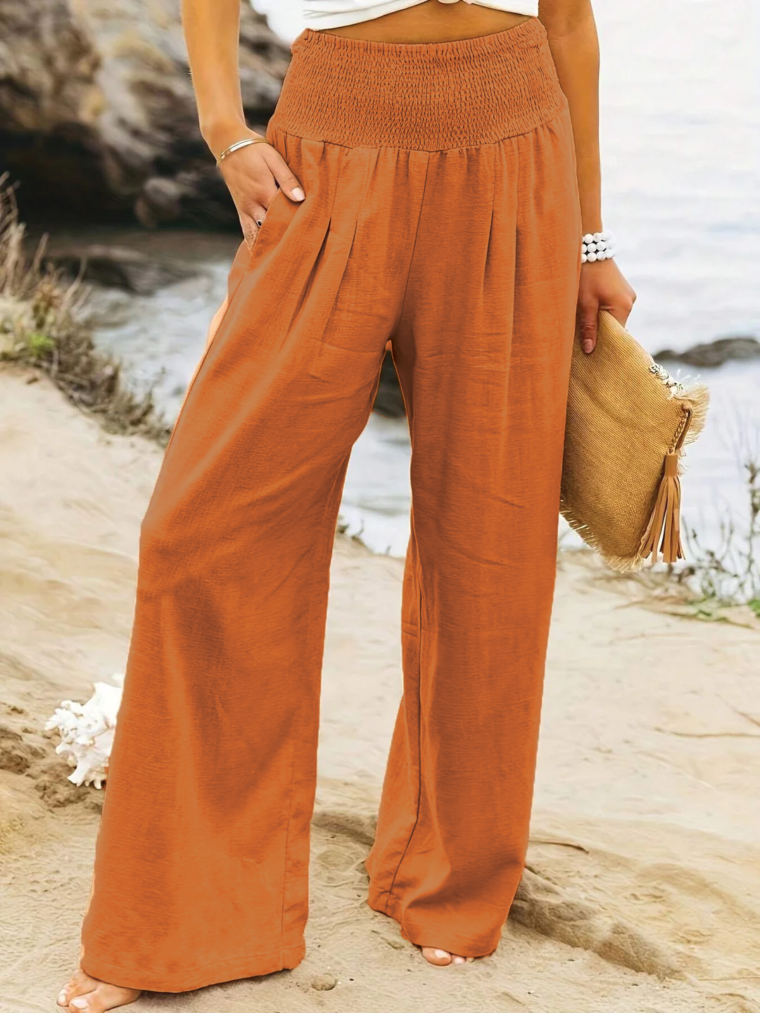 Women's woven wide-leg trousers in orange