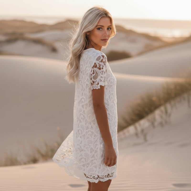 Women's lace overlay mini dress in white - detail