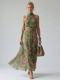 Women's halter neck midi dress in green - front