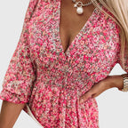 Women's floral v-neck mini dress in green - back