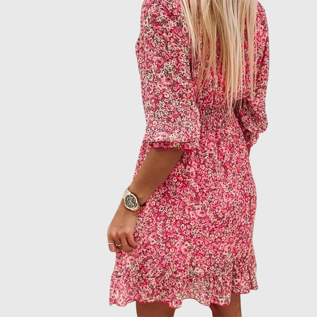 Women's floral v-neck mini dress in blue - back